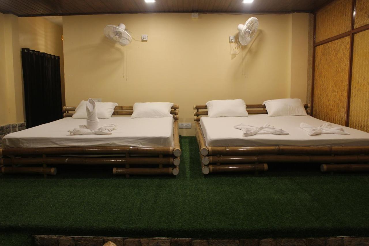 Tusker Tea County Hotel Chalsa Exterior photo